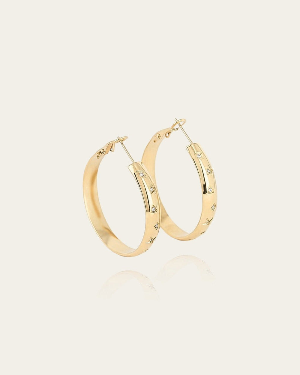 Boucles d'oreilles Solaris (Acier doré)