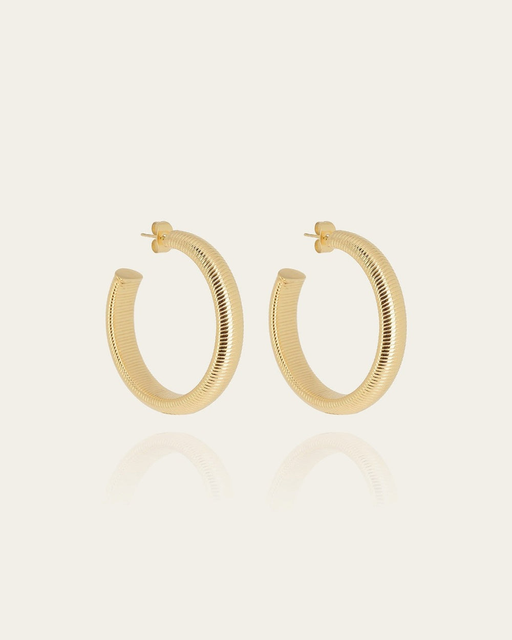 Boucles d'oreilles Itach (Acier doré)